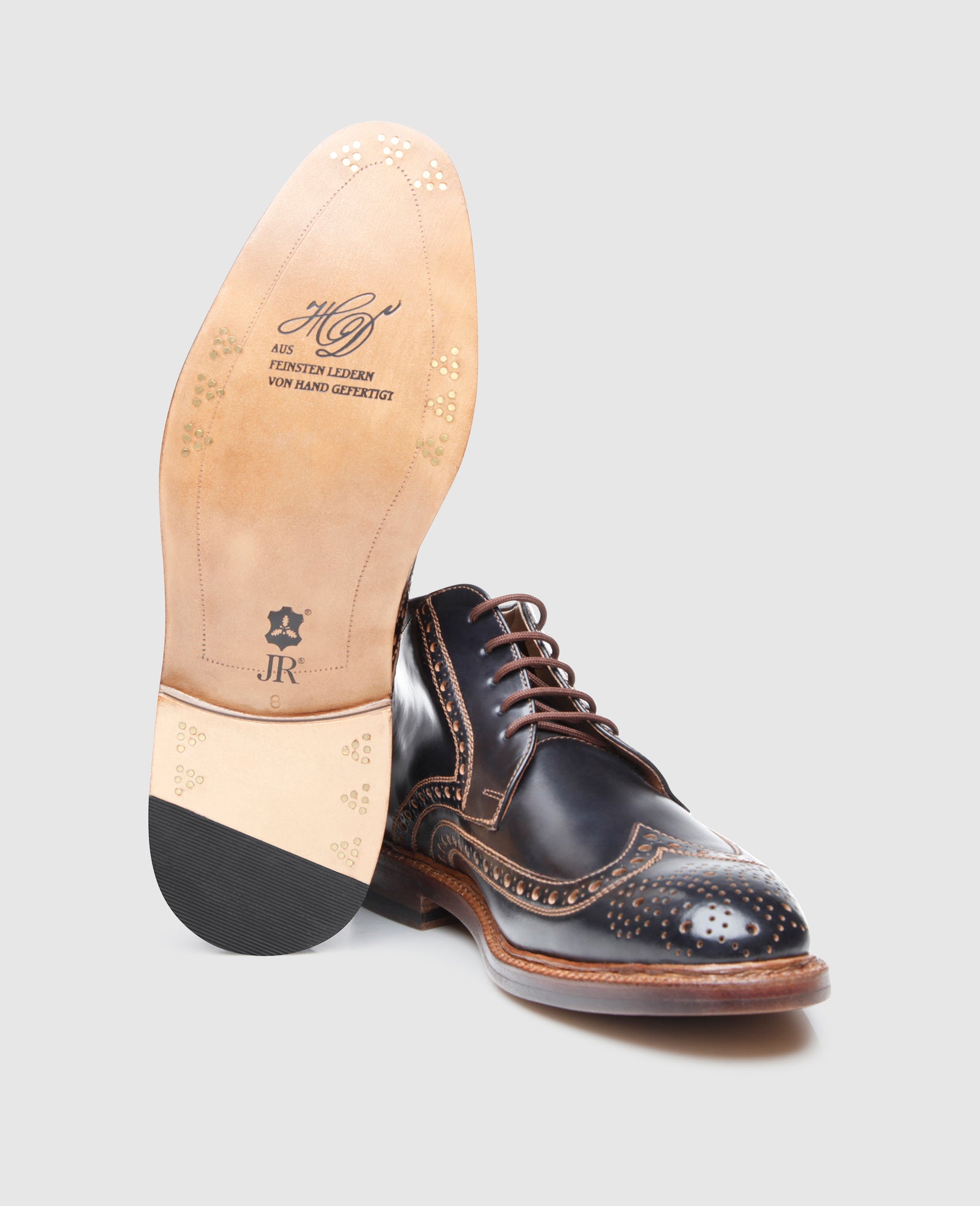Luxurious men's boot made of Shell Cordovan by Heinrich Dinkelacker.